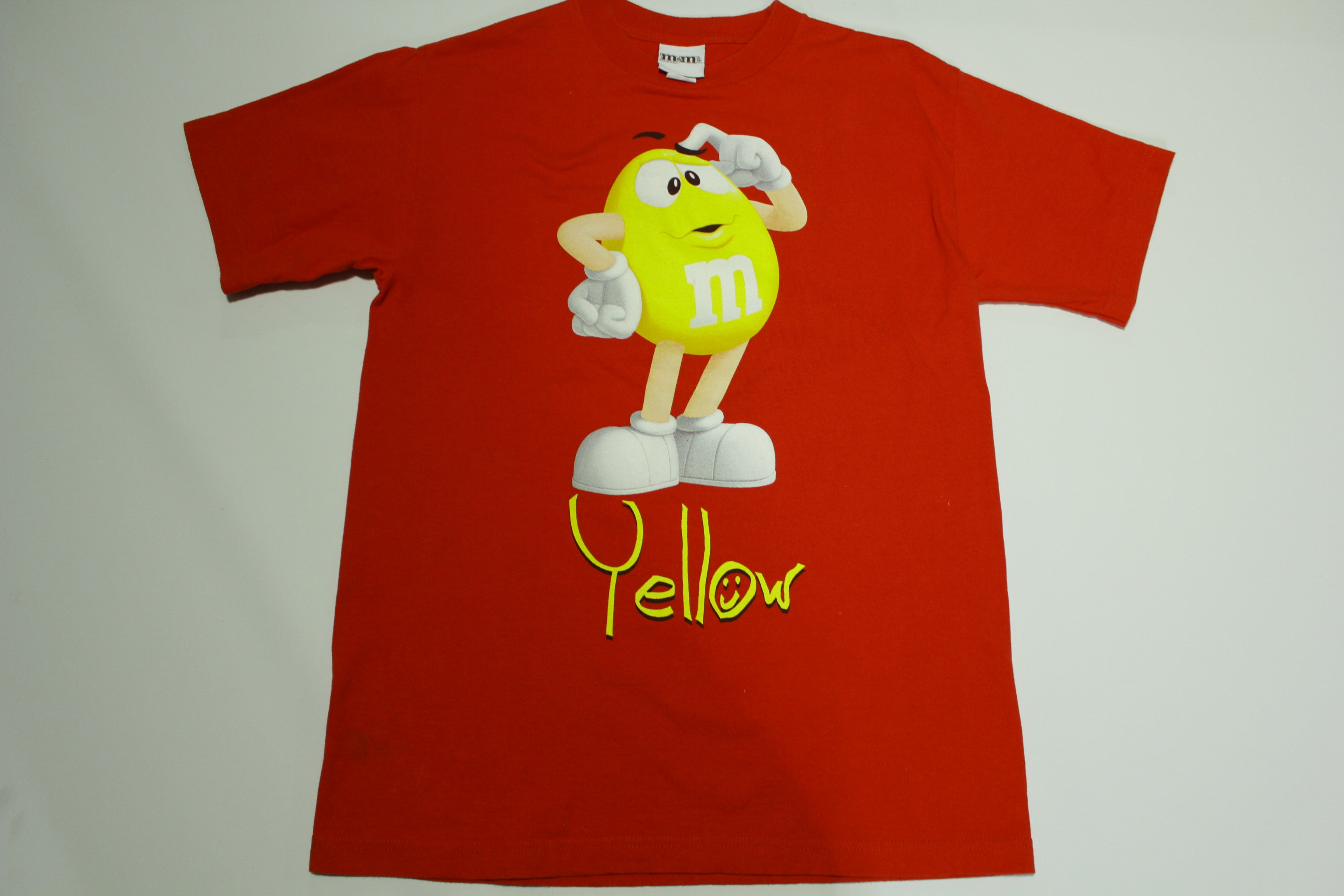 M M Yellow Confused 2000s Official Candy Snack T Shirt thefuzzyfelt