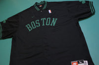 Boston Celtics Nike Warm up Jersey. Vintage Black Snap Spellout.