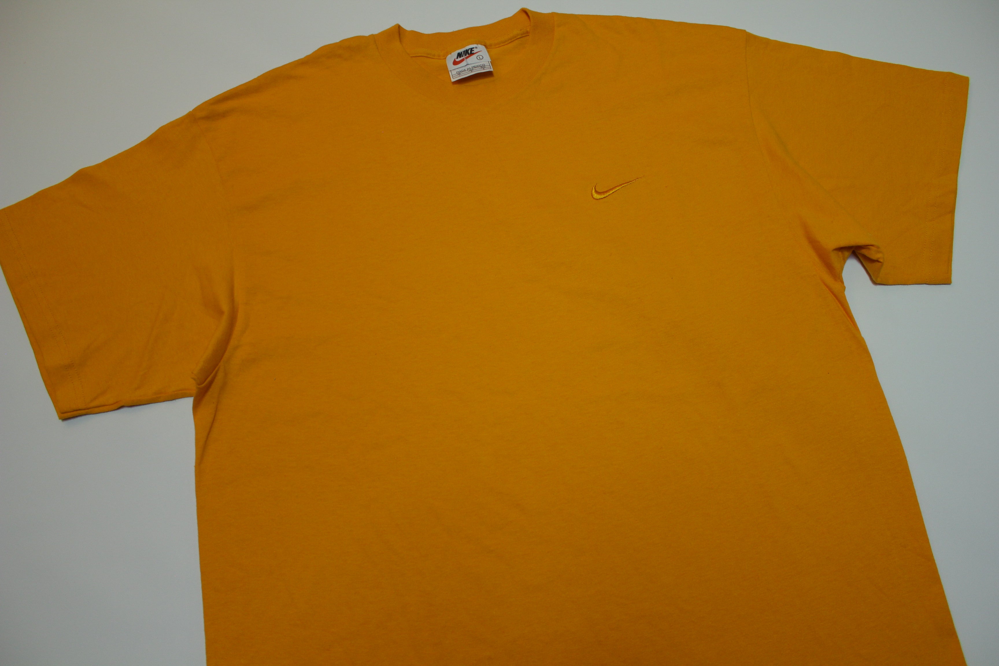 fluorescent orange nike shirt