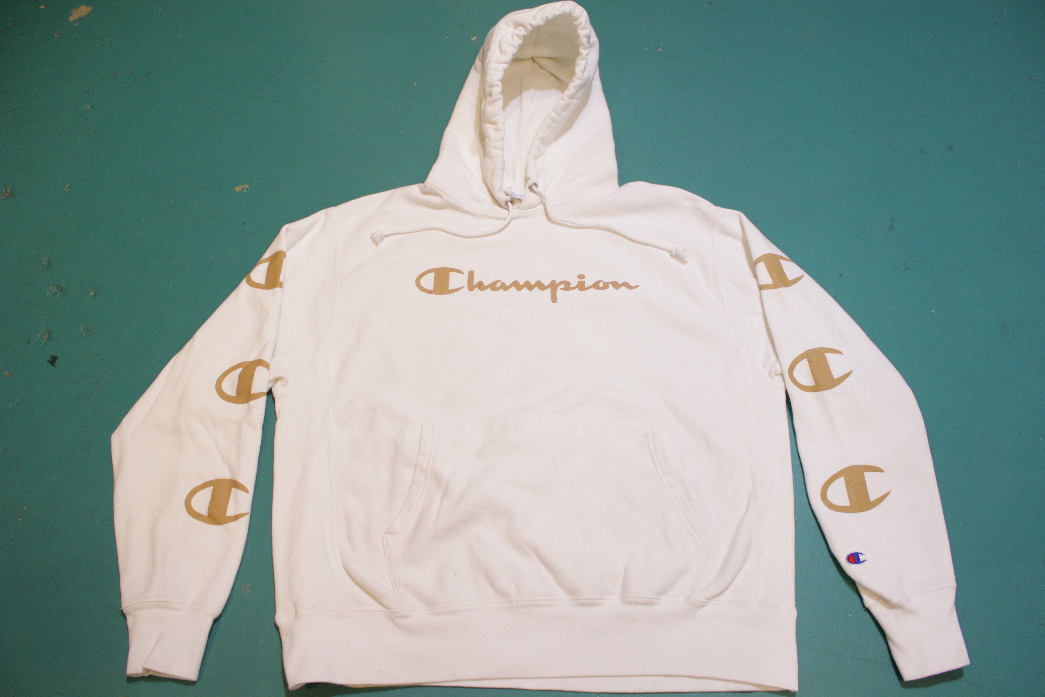 Champion white best sale and gold hoodie