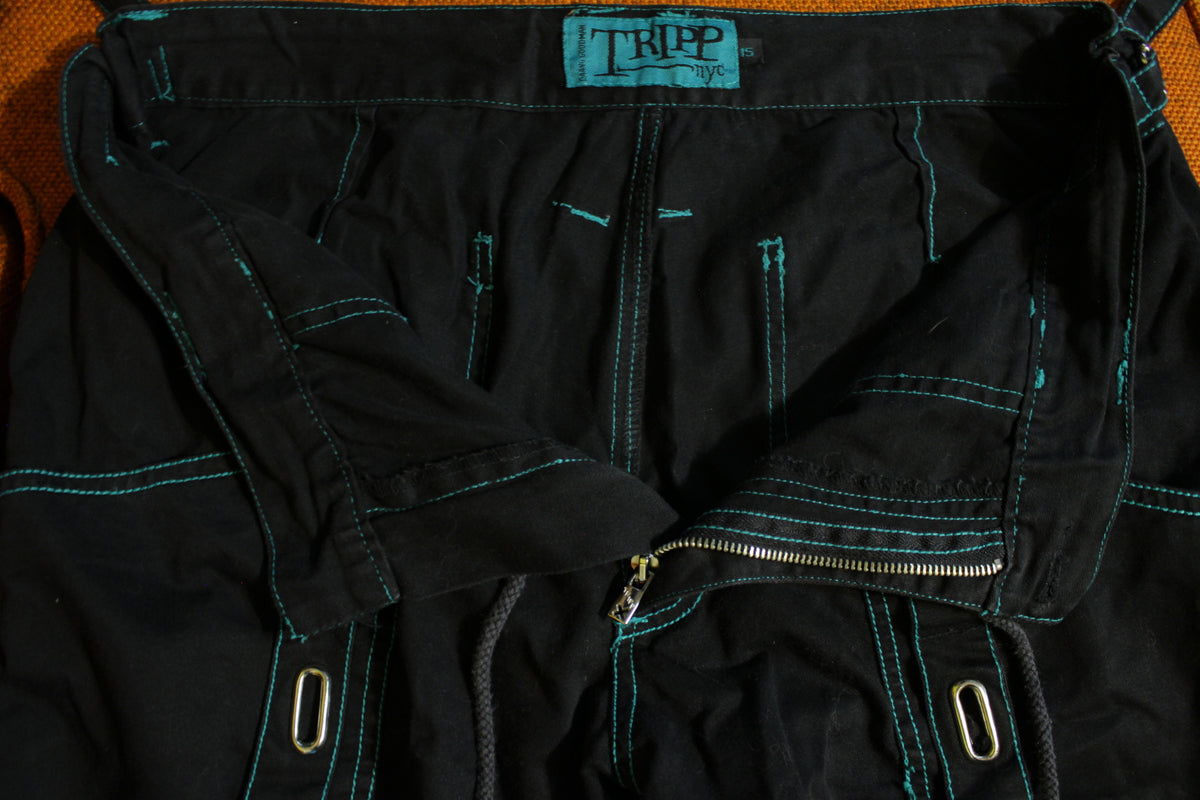 Tripp NYC rave pants Black and orange grommet 3D - Depop