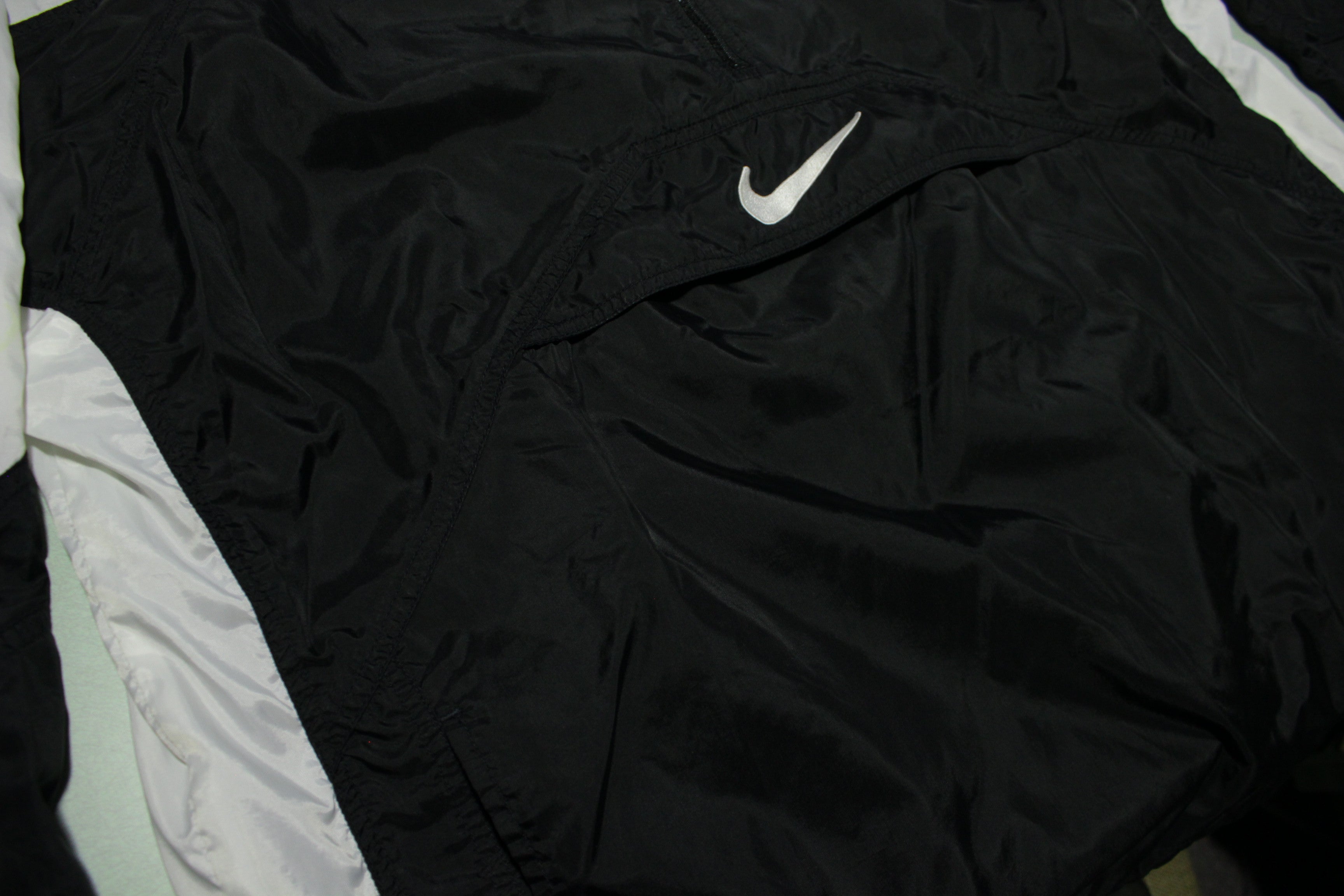 Vintage black nike clearance windbreaker