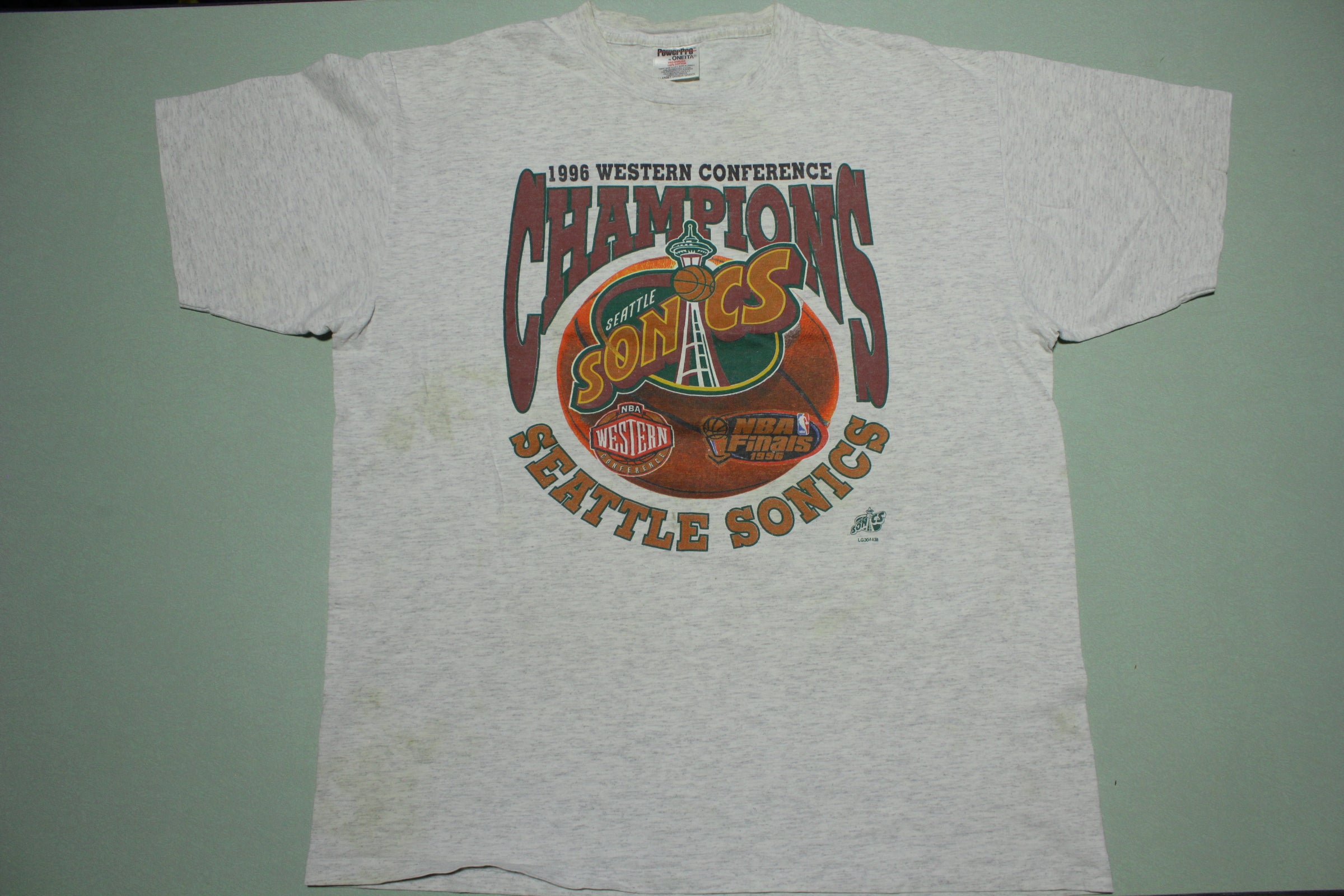 Vintage Seattle Sonics NBA All Over Graphic T-Shirt. Tagged As A Large