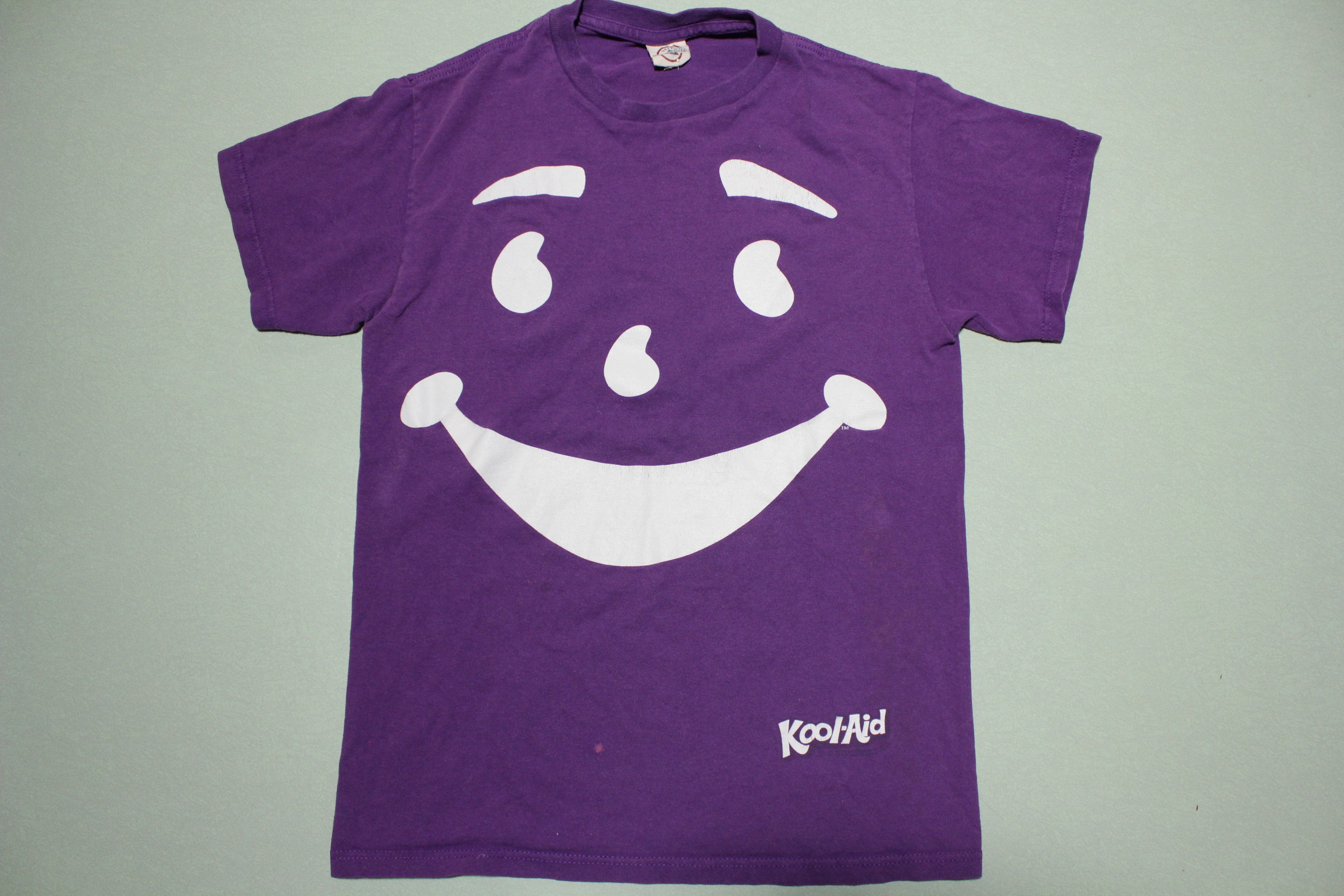 Purple kool aid man hot sale shirt